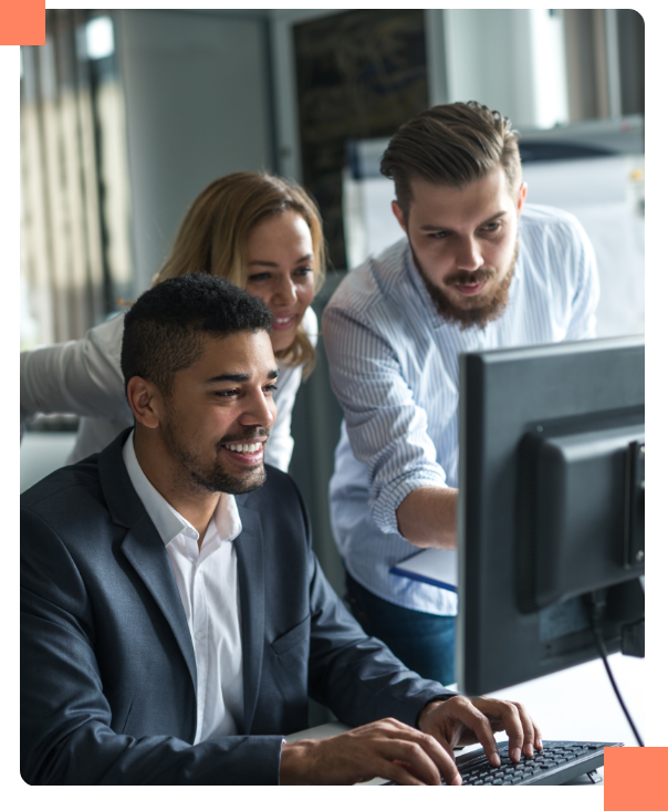 corporateteam Team of people working around a computer