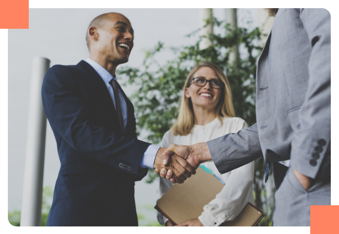 investors-handshake Man shaking hands with an another